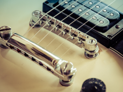 An electric guitar bridge assembly and pickups