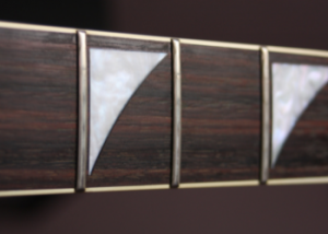 Guitar neck with strings removed