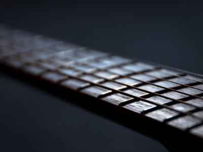 The neck of the guitar has a slight curvature