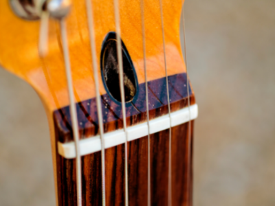 The “nut” is located at the top of the neck