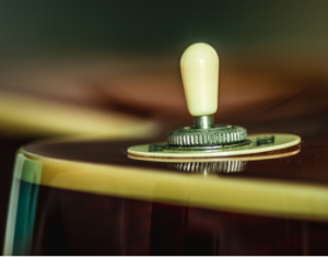 The pickup toggle switch on an electric guitar
