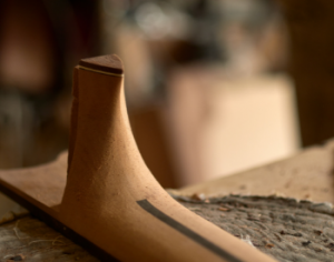 The heel of an acoustic guitar neck