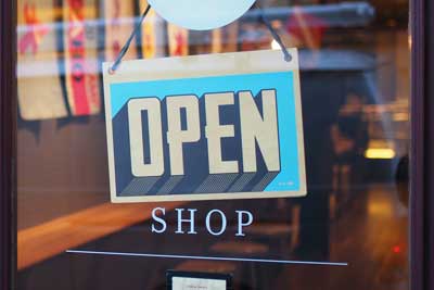 Buy, learn more, shop, open sign