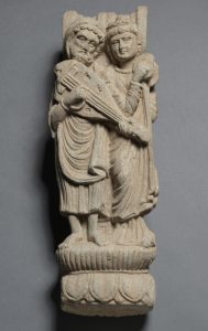 Statuette of two people and an oud