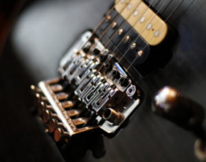 An adjustable bridge system for electric guitar