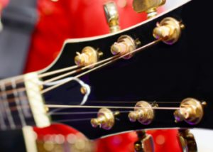 The headstock on an electric guitar