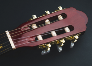The headstock on a nylon string guitar